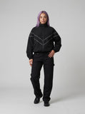 DAXUEN Loose-fit utility trousers in olive green and black — model photo