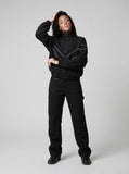 DAXUEN Loose-fit utility trousers in olive green and black — model photo