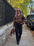 DAXUEN Loose-fit utility trousers in olive green and black — model photo