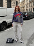 DAXUEN Wide leg utility pants with paint splatter effect — model photo