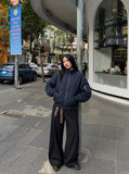 DAXUEN dark navy oversized bomber jacket with utility pockets — model photo