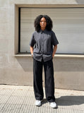 DAXUEN Short-sleeved button-up shirt with utility pockets — model photo