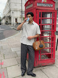 DAXUEN Short-sleeved button-up shirt with utility pockets — model photo