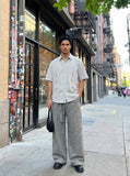 DAXUEN Short-sleeved button-up shirt with utility pockets — model photo
