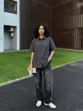 DAXUEN Short-sleeved button-up shirt with utility pockets — model photo