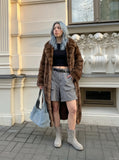 DAXUEN Loose-fitting utility shorts with pockets and belt — model photo