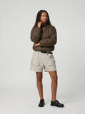 DAXUEN Loose-fitting utility shorts with pockets and belt — model photo