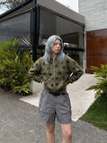 DAXUEN Loose-fitting utility shorts with pockets and belt — model photo
