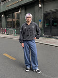 DAXUEN muted blue denim utility wide-leg pants — model photo