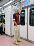 DAXUEN light beige wide-leg cargo pants with large pockets — model photo