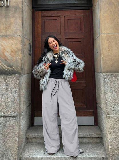 DAXUEN Wide-leg utility pants with drawstring and pockets — model photo