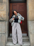 DAXUEN Wide-leg utility pants with drawstring and pockets — model photo