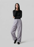 DAXUEN Wide-leg utility pants with drawstring and pockets — model photo