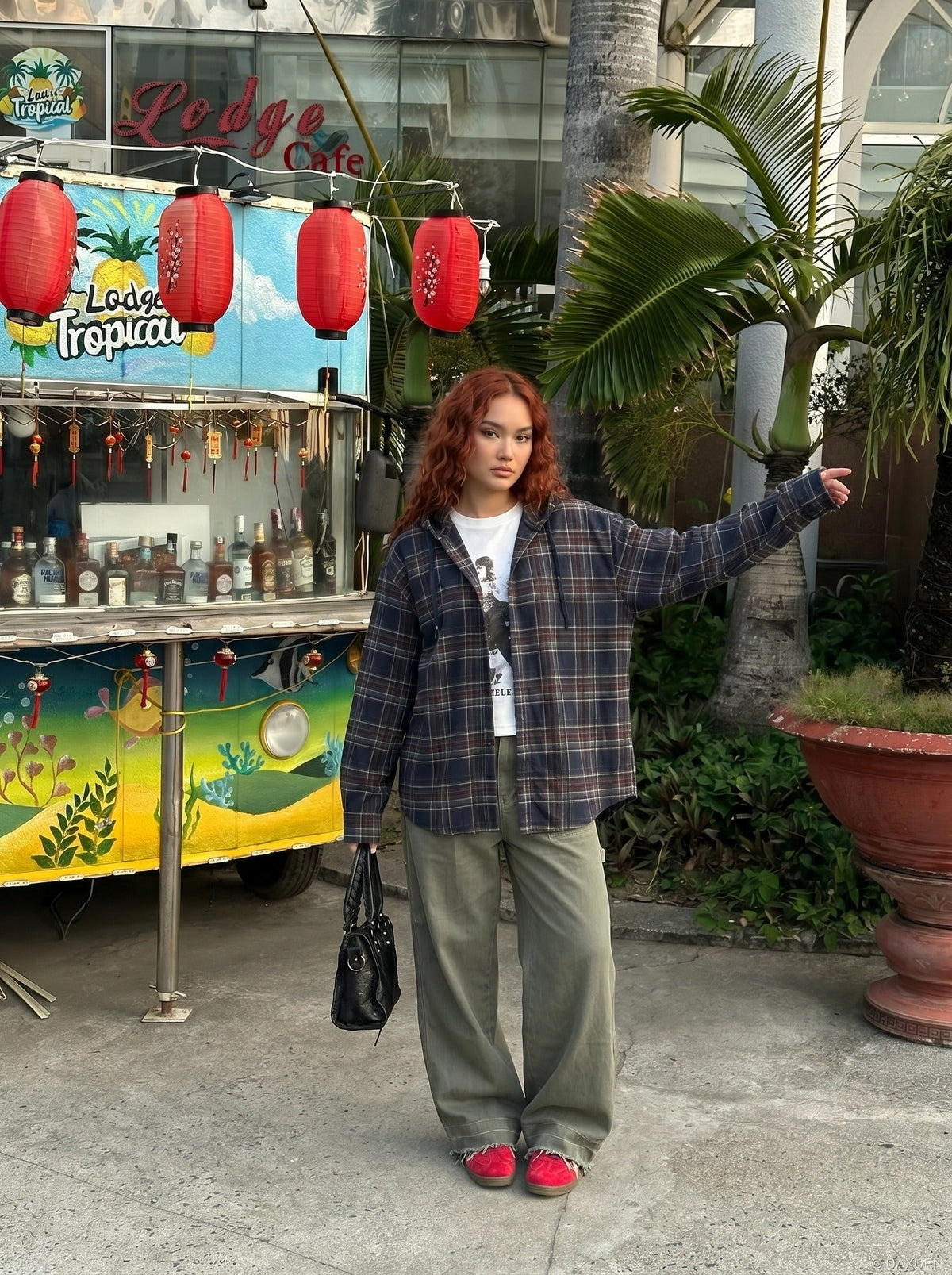 DAXUEN Utility wide-leg pants in khaki and olive green — model photo