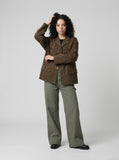 DAXUEN Utility wide-leg pants in khaki and olive green — model photo