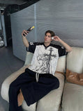 DAXUEN Oversized short-sleeved graphic T-shirt — model photo