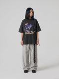 DAXUEN Oversized short-sleeve graphic T-shirt with nocturnal scene — model photo