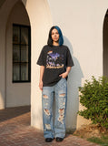 DAXUEN Oversized short-sleeve graphic T-shirt with nocturnal scene — model photo