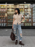 DAXUEN black vertical cable knit vest — model photo