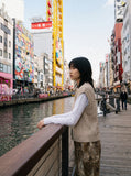 DAXUEN black vertical cable knit vest — model photo