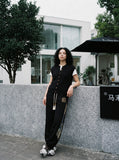 DAXUEN black vertical cable knit vest — model photo