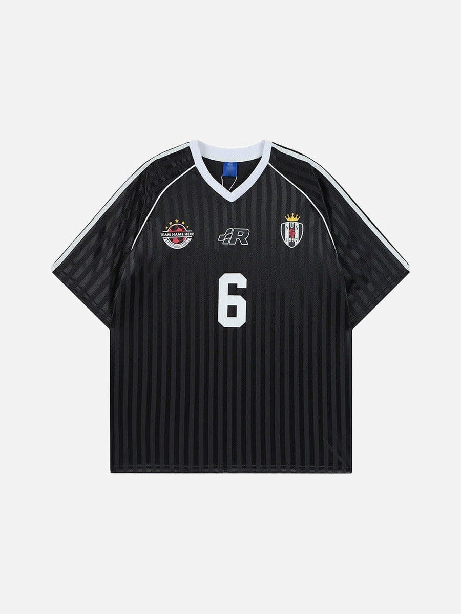 Black short sleeve v-neck football jersey with tonal vertical stripes, chest crest graphics, and a white number 6 on the center front