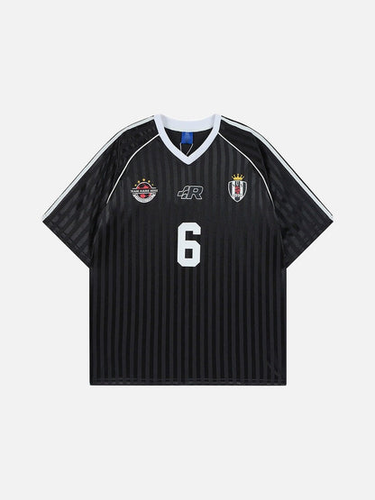 Black short sleeve v-neck football jersey with tonal vertical stripes, chest crest graphics, and a white number 6 on the center front