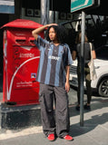 DAXUEN Short-sleeved vertical stripe polo shirt — model photo