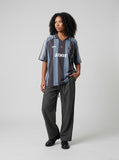 DAXUEN Short-sleeved vertical stripe polo shirt — model photo