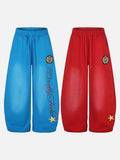 DAXUEN vibrant blue balloon-silhouette sweatpants with embroidered crest