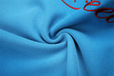 DAXUEN vibrant blue balloon-silhouette sweatpants with embroidered crest