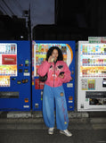 DAXUEN vibrant blue balloon-silhouette sweatpants with embroidered crest — model photo