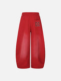 DAXUEN vibrant blue balloon-silhouette sweatpants with embroidered crest