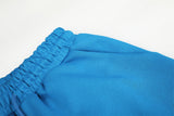 DAXUEN vibrant blue balloon-silhouette sweatpants with embroidered crest