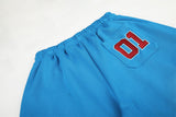 DAXUEN vibrant blue balloon-silhouette sweatpants with embroidered crest