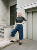 DAXUEN blue cropped wide-leg brushstroke print jeans — model photo