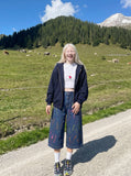 DAXUEN blue cropped wide-leg brushstroke print jeans — model photo