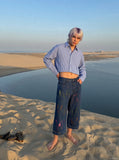 DAXUEN blue cropped wide-leg brushstroke print jeans — model photo