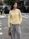 DAXUEN Pale yellow long-sleeved button-up shirt with colorful buttons — model photo