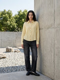 DAXUEN Pale yellow long-sleeved button-up shirt with colorful buttons — model photo