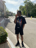 DAXUEN Oversized short-sleeved T-shirt with vibrant graphic print — model photo