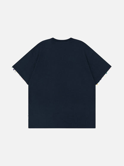 Graphic crew neck t-shirt with embroidered designs