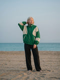 DAXUEN vibrant green colour-block track jacket — model photo