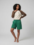 DAXUEN vibrant green relaxed-fit knee-length shorts — model photo