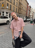 DAXUEN pink multi-colored plaid button-up shirt — model photo