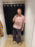 DAXUEN pink multi-colored plaid button-up shirt — model photo