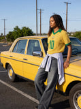 DAXUEN yellow short-sleeve mesh polo with emblem and number 10 — model photo