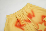 DAXUEN vibrant yellow oversized star graphic sweatpants