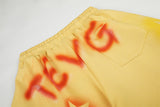 DAXUEN vibrant yellow oversized star graphic sweatpants