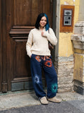 DAXUEN vibrant yellow oversized star graphic sweatpants — model photo